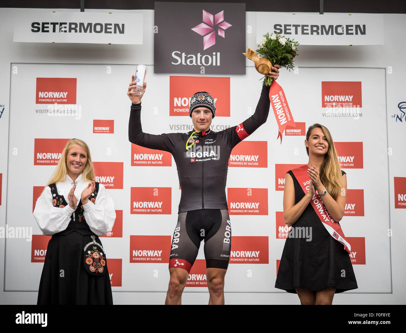 Setermoen, Norway. 14th August 2015. Sam Bennett from Ireland cycling for Bora-Argon 18 is crowned as the winner of the 2nd stage of Arctic Race of Norway 2015. The stage was 162,5km and started in Evenskjaer and ended in Setermoen. Credit:  Ole Mathisen/Alamy Live News Stock Photo