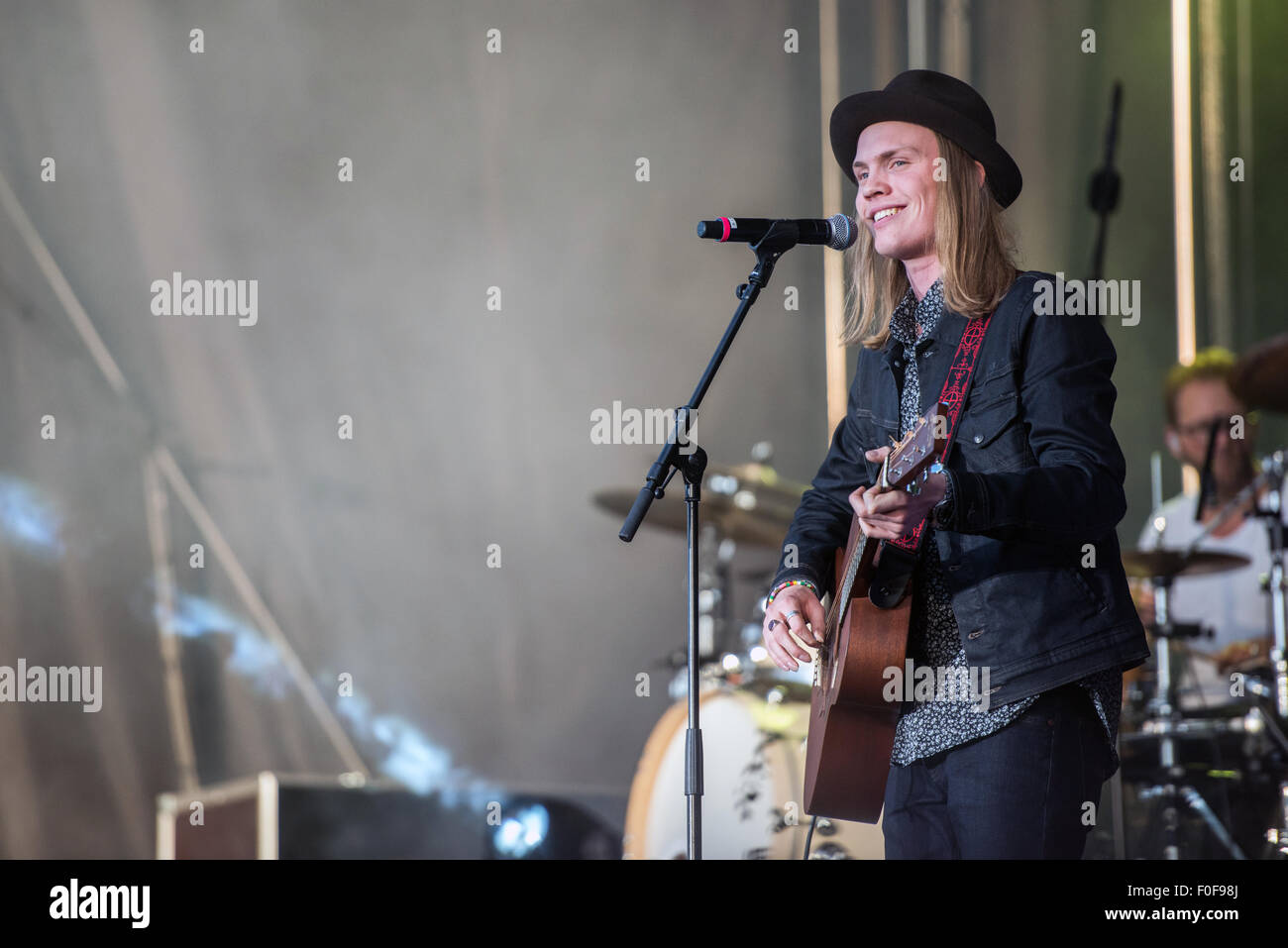 Young male swedish music artist jakob karlberg stage performance hires