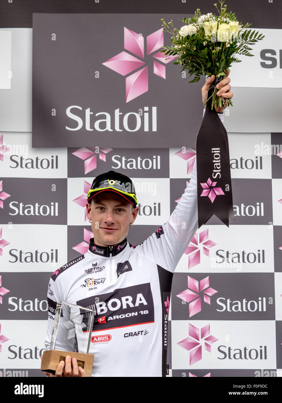 Setermoen, Norway. 14th August 2015. Sam Bennett from Ireland cycling for Bora-Argon 18 was awarded the white jersey for best young rider after the 2nd stage of Arctic Race of Norway 2015. The stage was 162,5km and started in Evenskjaer and ended in Setermoen. Sam Bennet was the winner of the 2nd stage. Credit:  Ole Mathisen/Alamy Live News Stock Photo