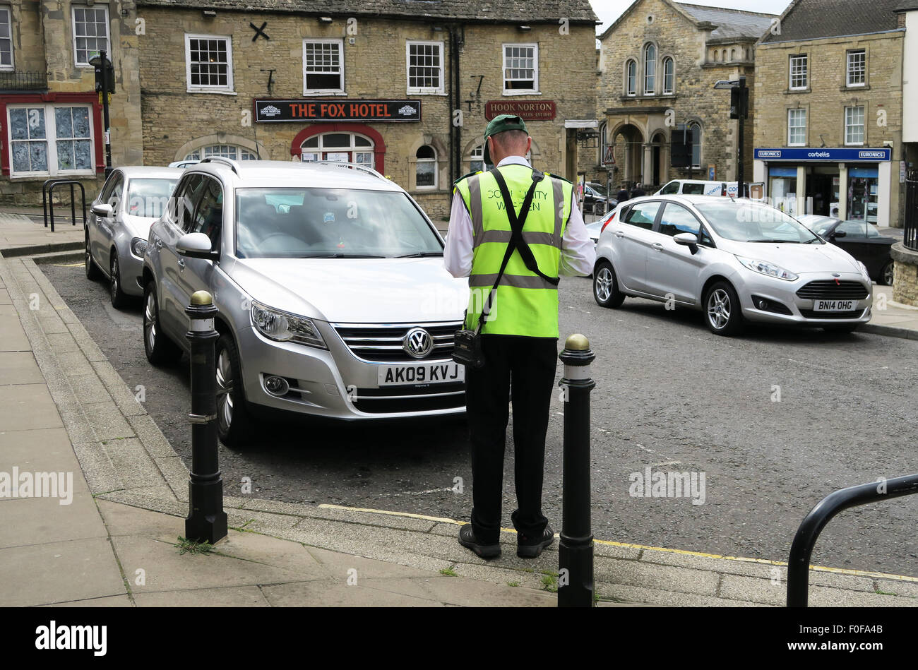 Parking warden in Chipping Norton in The Cotswolds Stock Photo Alamy