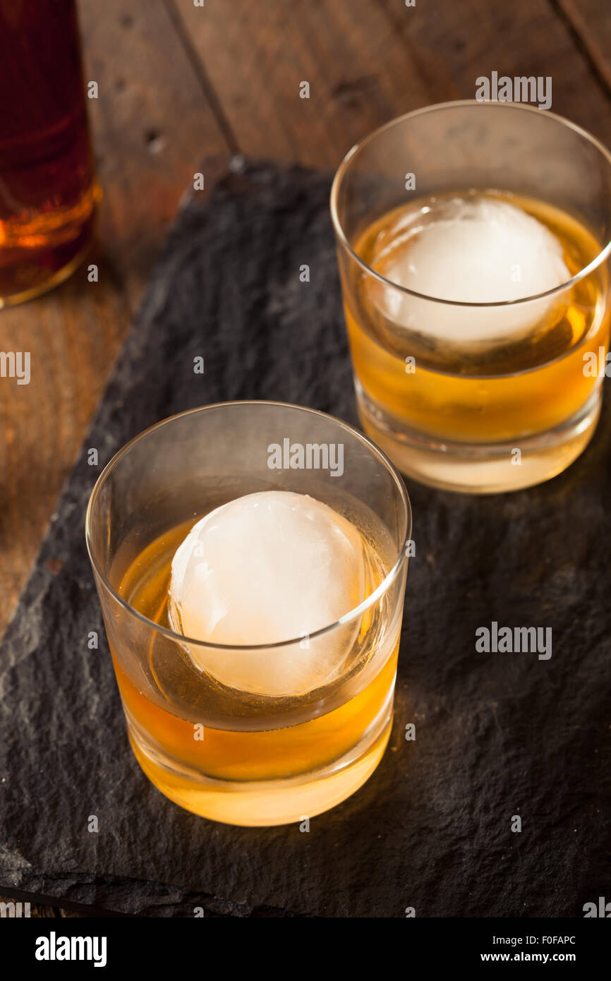 Bourbon Whiskey with a Sphere Ice Cube Ready to Drink Stock Photo Alamy