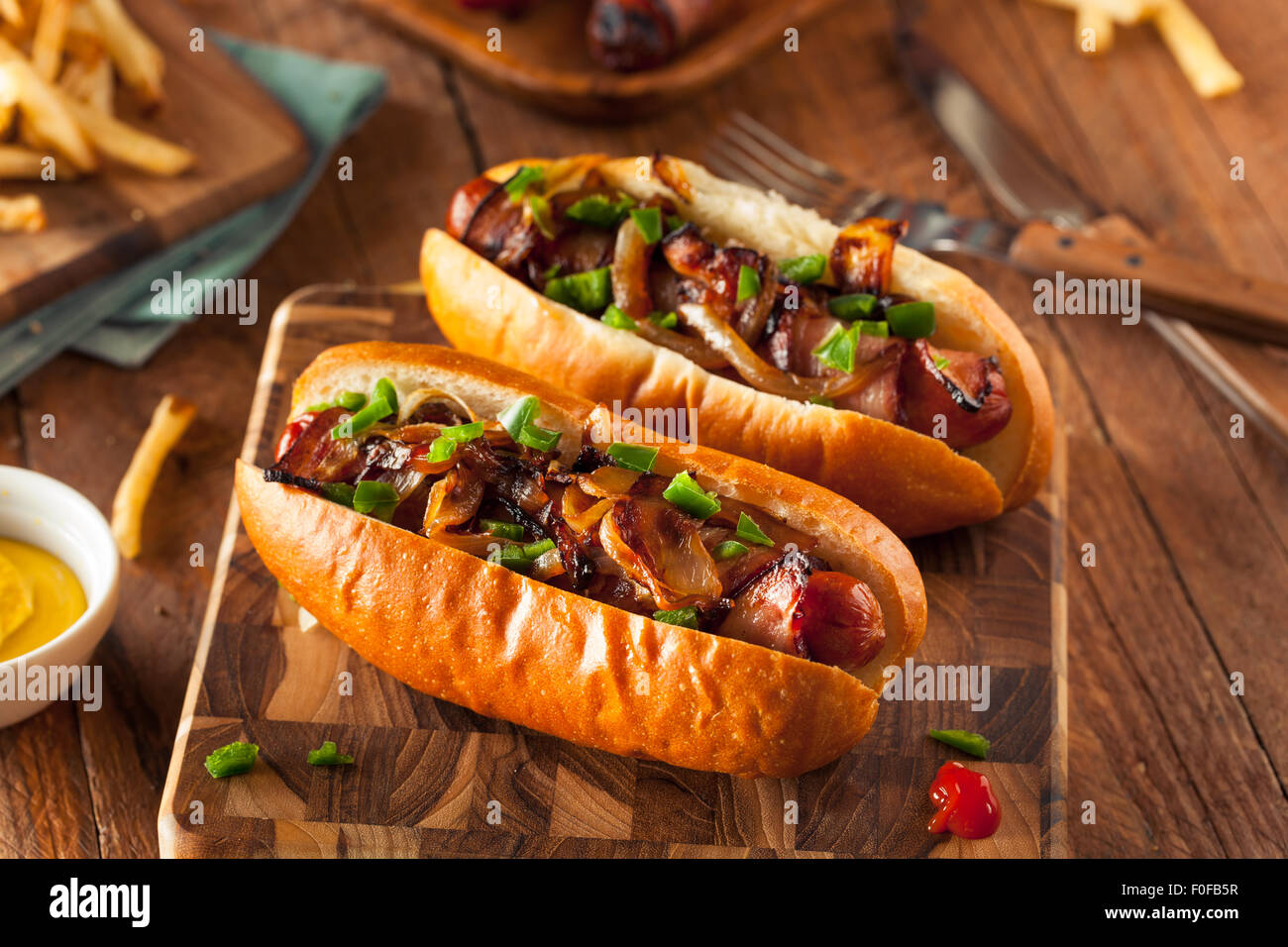 Homemade Bacon Wrapped Hot Dogs with Onions and Peppers Stock Photo Alamy