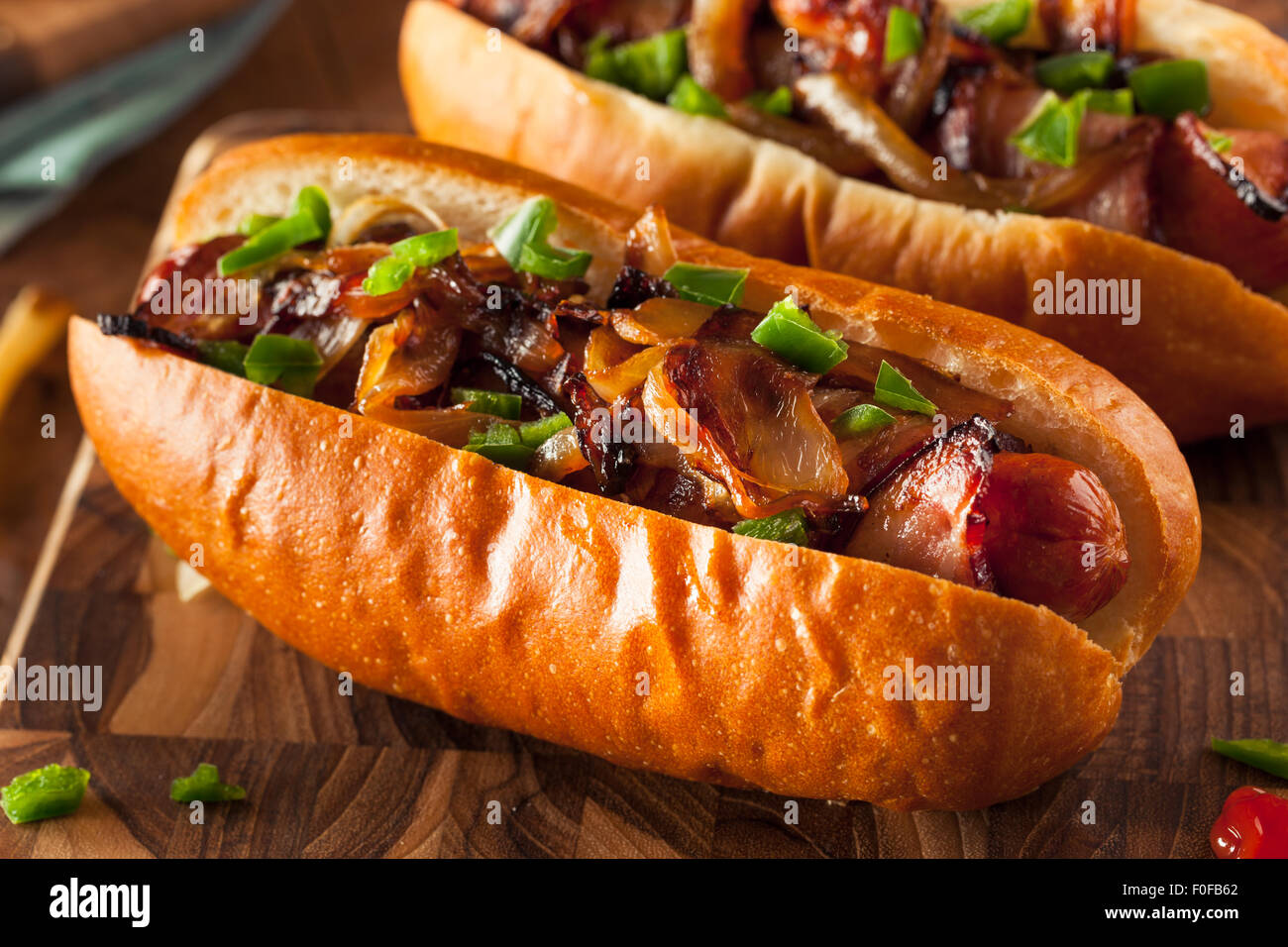 Homemade Bacon Wrapped Hot Dogs with Onions and Peppers Stock Photo Alamy