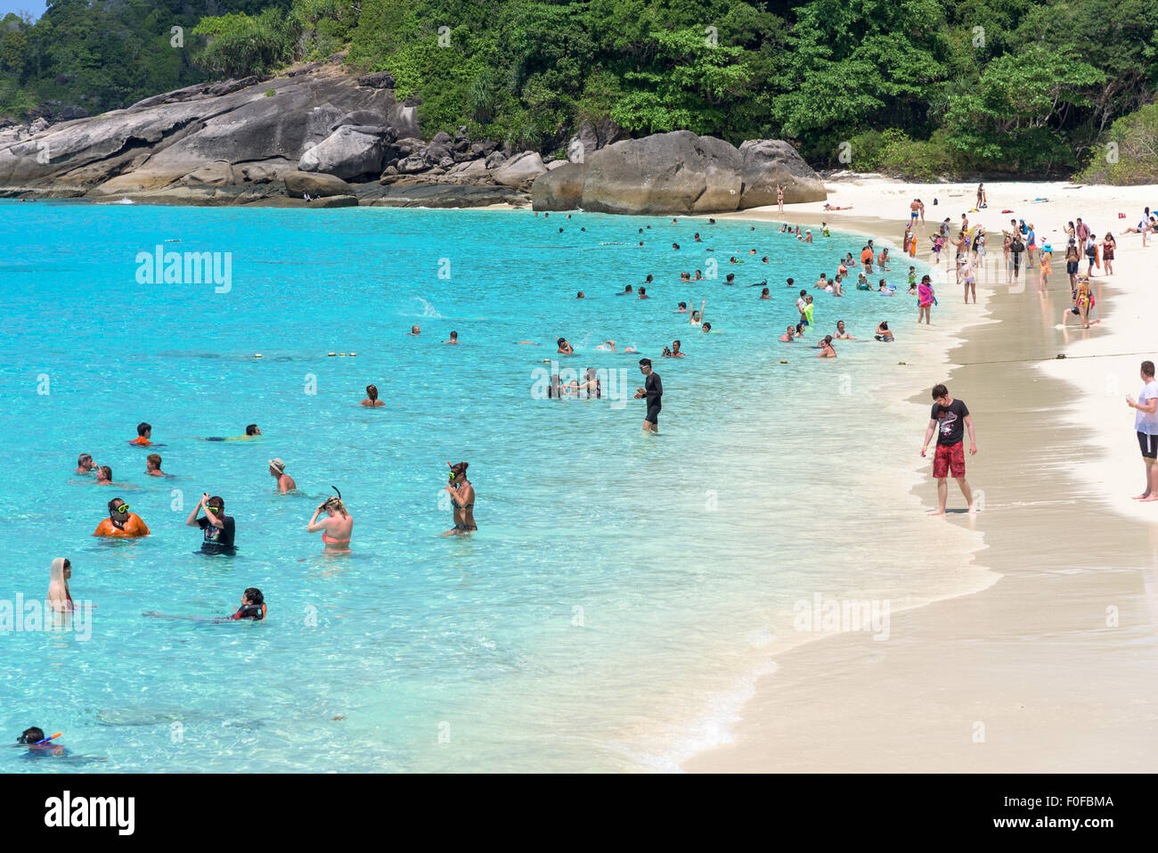 PHUKET, THAILAND - APRIL 30 2015: Tourists are enjoying clear water at the beach of Koh Miang island is a beautiful attractions Stock Photo