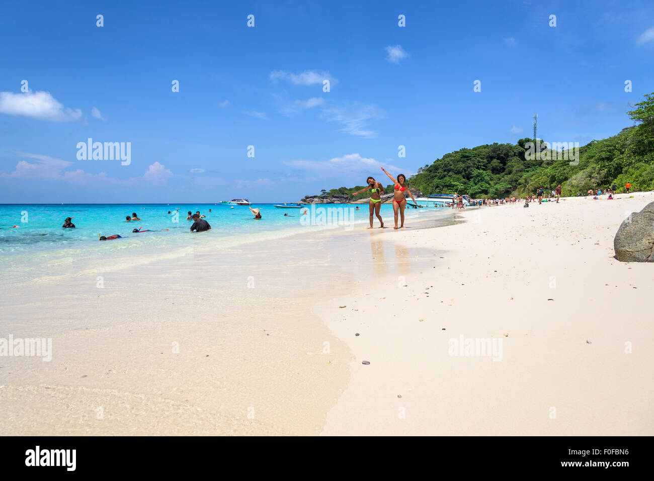 PHUKET, THAILAND - APRIL 30 2015: Tourists are enjoying clear water at the beach of Koh Miang island is a beautiful attractions Stock Photo