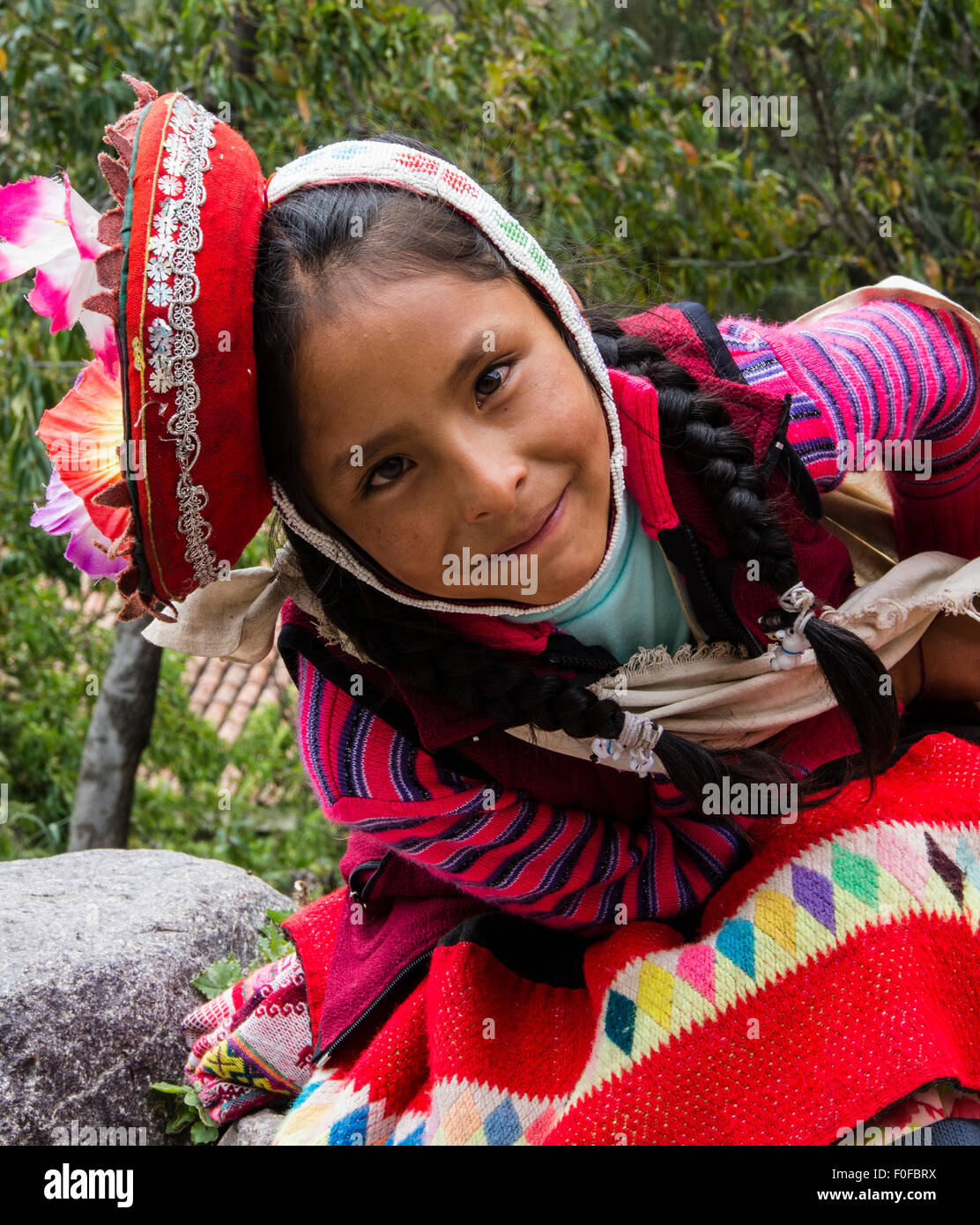 Inca girl in Ollantaytambo, Cusco, Peru. Stock Photo