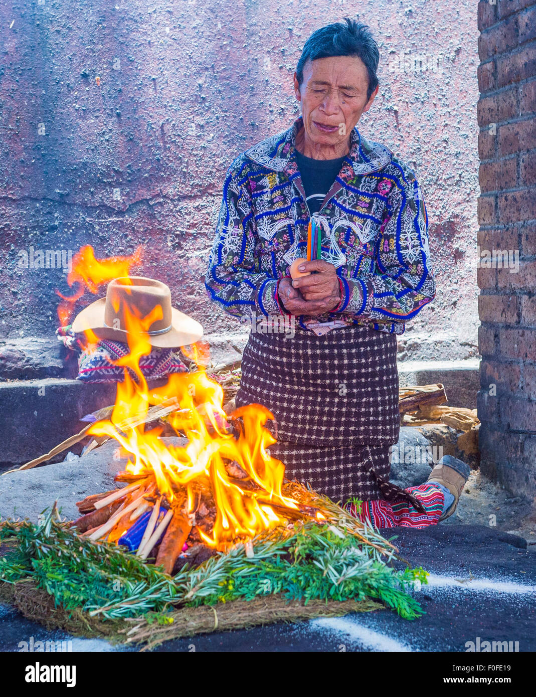 Guatemalan man take part in a traditional Mayan ceremony in Chichicastenango , Guatemala Stock Photo