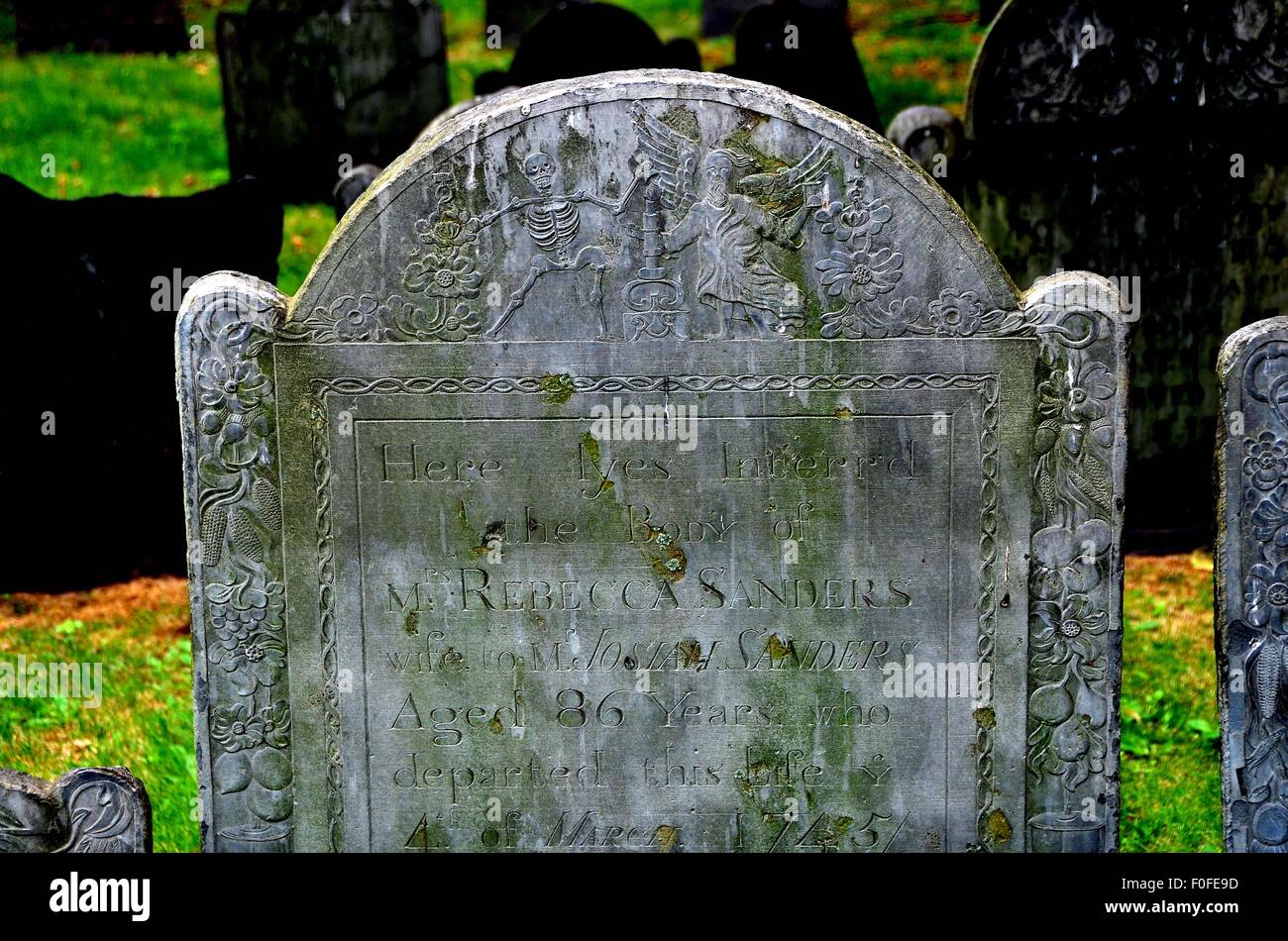 Boston, MA: 18th century gravestone with bas relief depicting the dance of death at King's Chapel burial ground Stock Photo