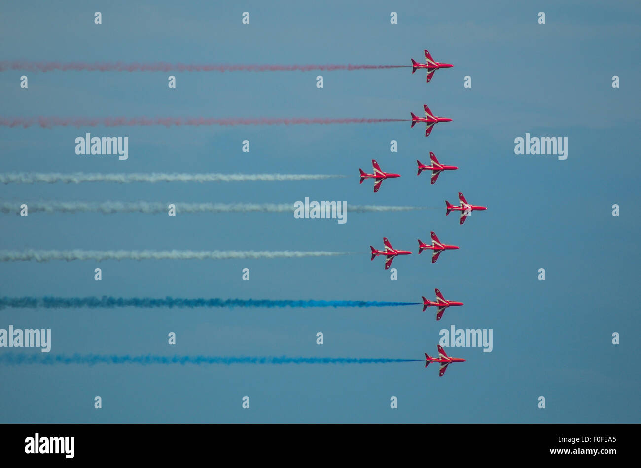Eastbourne, East Sussex, UK..14 August 2015..Airbourne flying display went ahead today after yesterdays cancellation due to Stormy weather. Red Arrows.. Stock Photo