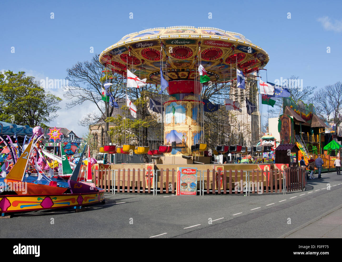 Fairground rides which fill the streets of Llandudno during the Victorian Extravaganza, held every year in May. Stock Photo
