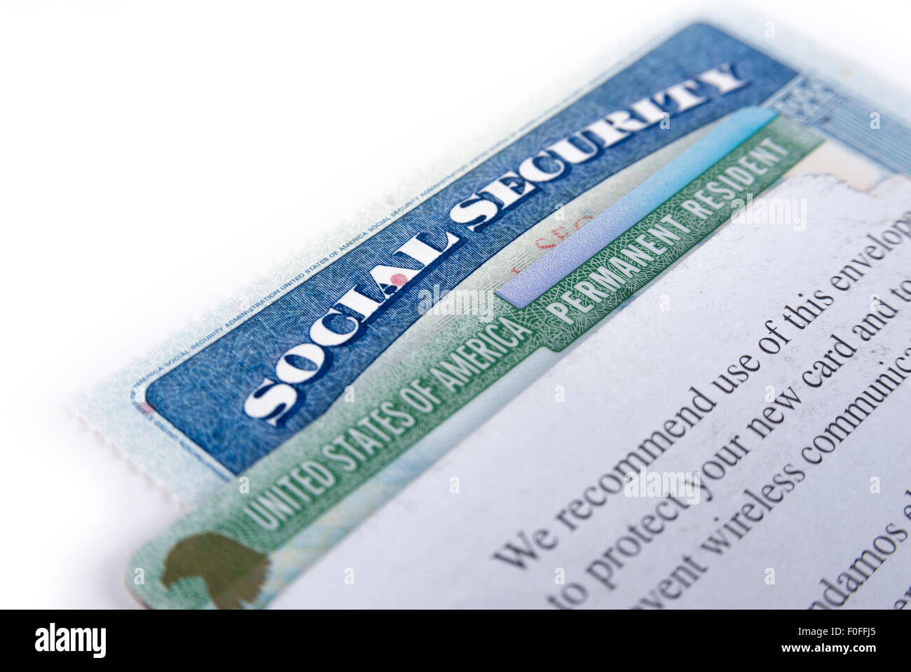 United States of America social security and green card on white background Stock Photo