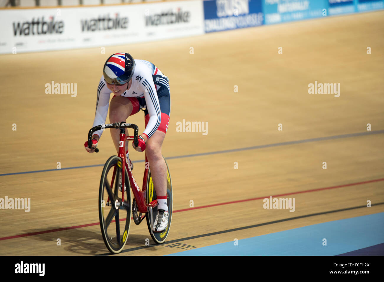 Katie Archibald competes in the scratch race at the Revolution Series at Derby Arena, Derby, United Kingdom on 14 August 2015. The Revolution Series is a professional track racing series featuring many of the world's best track cyclists. This event, taking place over 3 days from 14-16 August 2015, is an important preparation event for the Rio 2016 Olympic Games, allowing British riders to score qualifying points for the Games. Stock Photo
