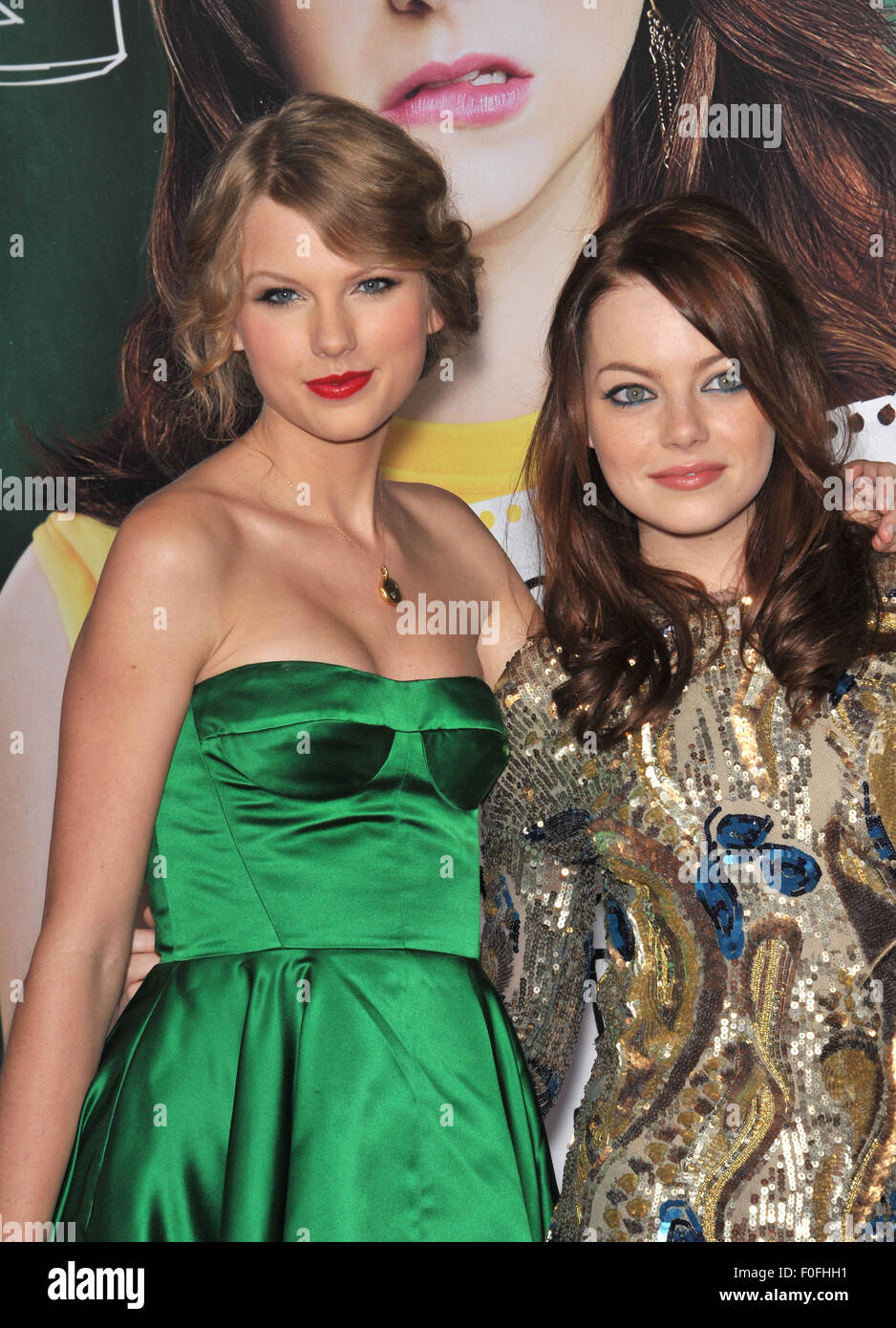LOS ANGELES, CA - SEPTEMBER 13, 2010: Emma Stone & Taylor Swift (in green) at the premiere of Stone's new movie 'Easy A' at Grauman's Chinese Theatre, Hollywood. Stock Photo