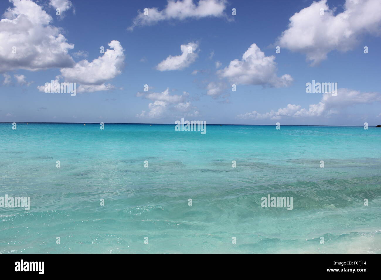 Blue ocean clouds in clear hi-res stock photography and images - Alamy