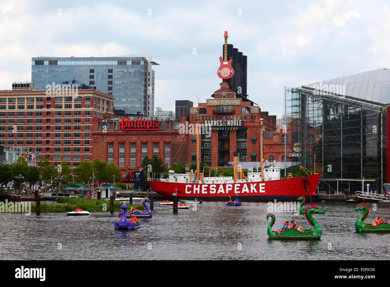 Lightship Chesapeake and Pratt Street Power Plant building, Baltimore Aquarium on RHS, Inner Harbor, Baltimore, Maryland. USA Stock Photo