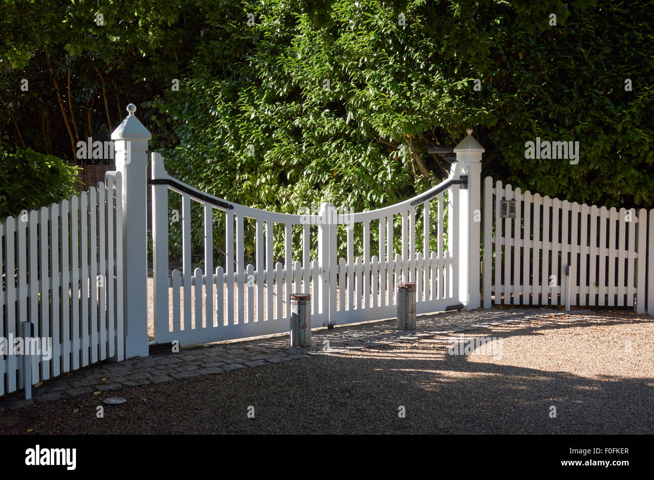 Gate and driveway to a country mansion Stock Photo