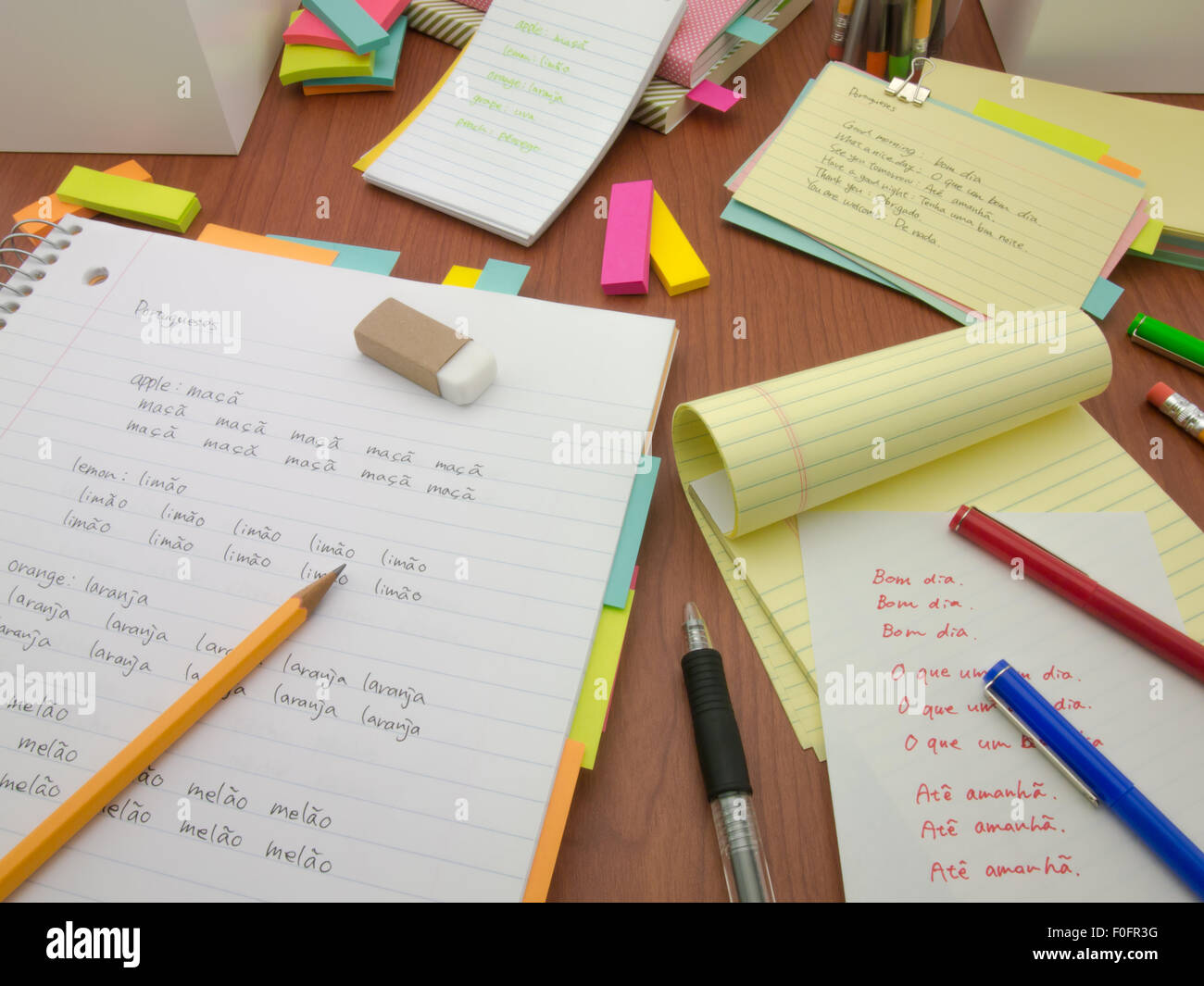 Writing new words again and again to learn new language Stock Photo - Alamy