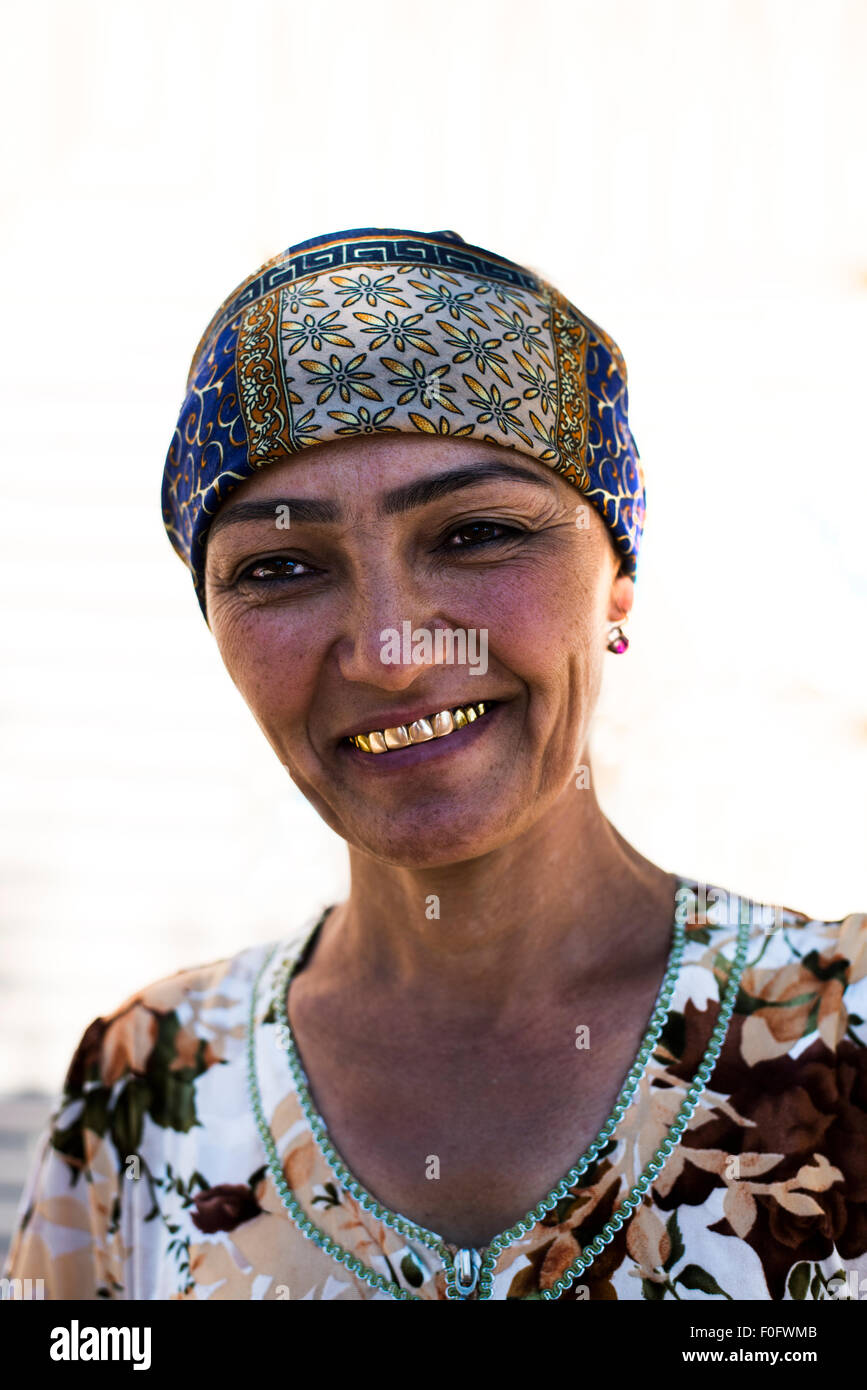 An Uzbek woman with golden teeth. Stock Photo