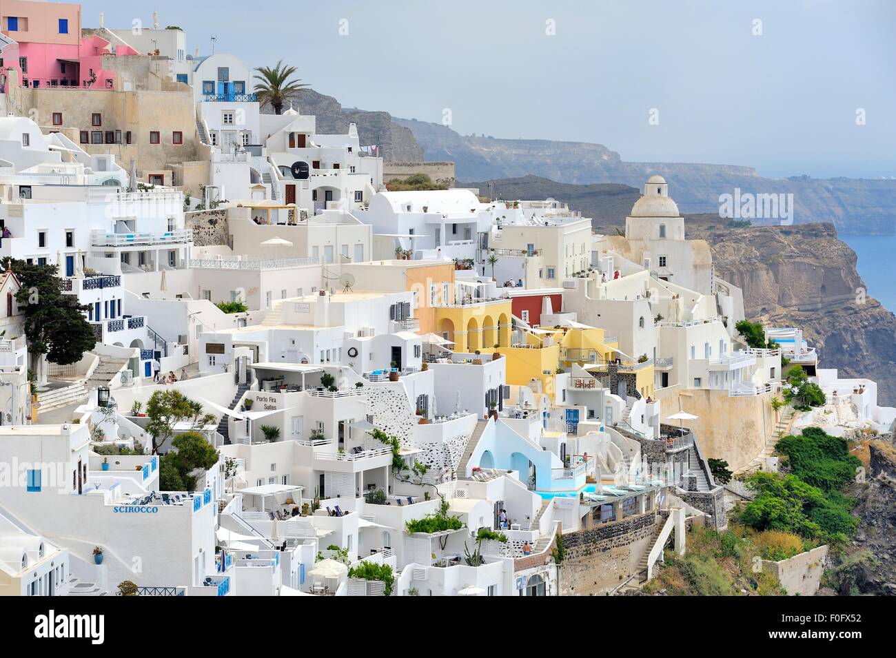 Whitewashed buildings stacked up in Fira the capital of Santorini Greece Stock Photo