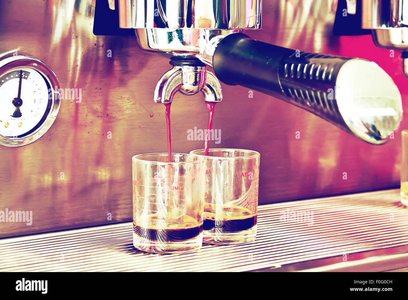 Process of preparation of coffee, a closeup.coffee machine in a cafe