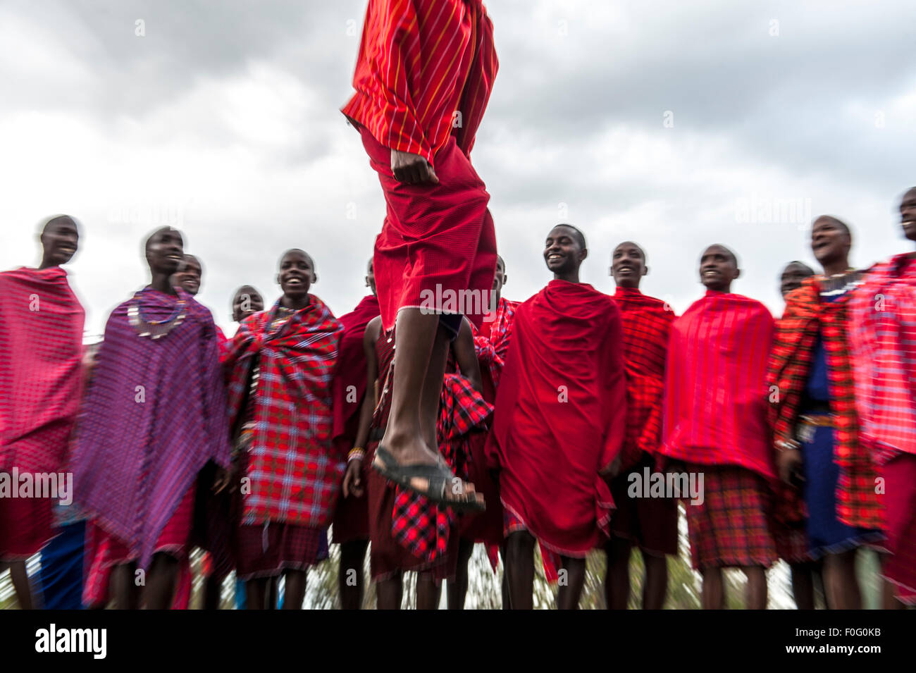 Traditional jumping dance Maasai people Mara Naboisho conservancy Kenya Africa Stock Photo