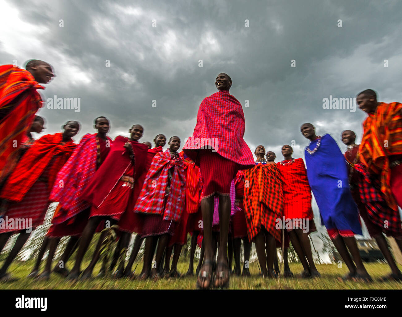 Traditional jumping dance Maasai people Mara Naboisho conservancy Kenya Africa Stock Photo