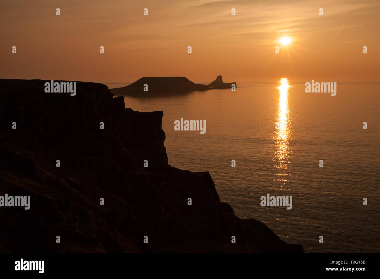 Worm's head on Rhossili bay on the Gower peninsular, South Wales, UK. Stock Photo