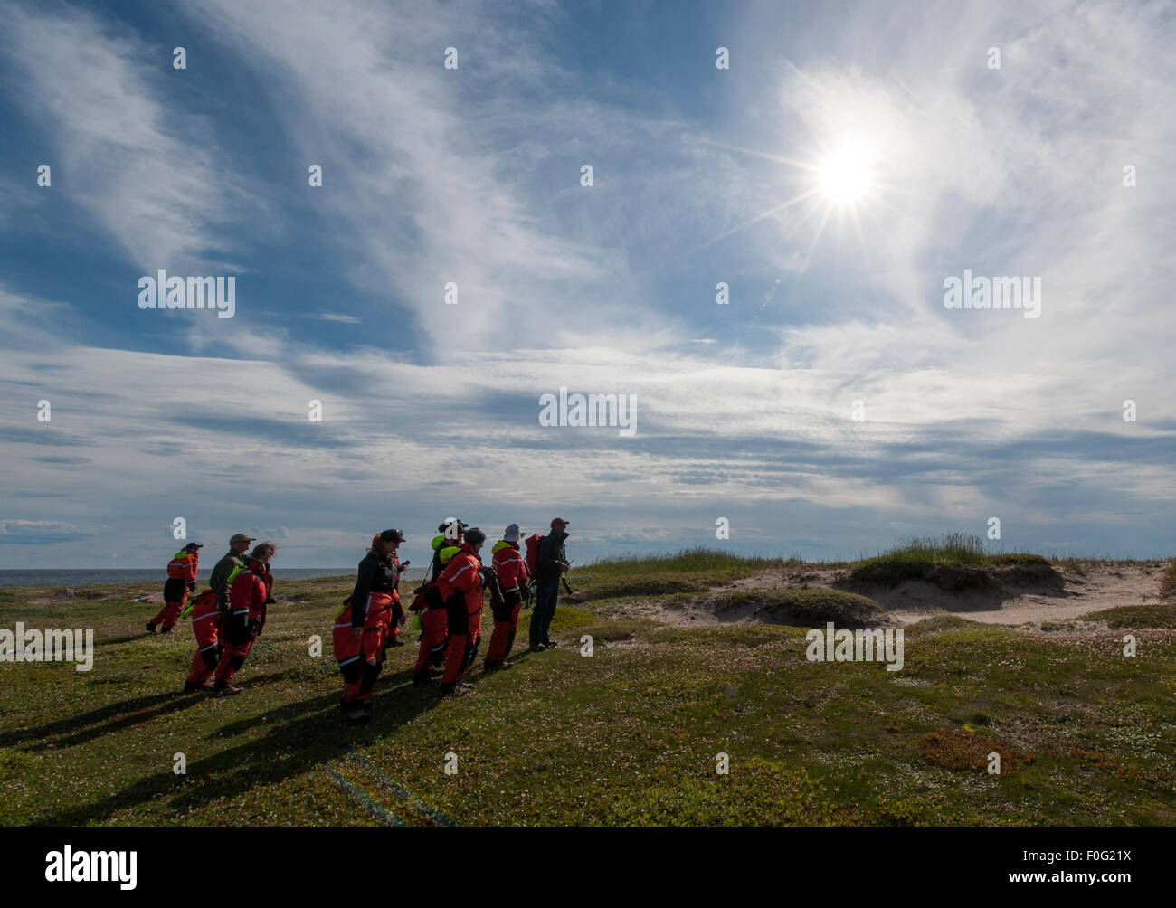 People hiking at Hubbart Point, Hudson Bay, Manitoba, Canada Stock Photo