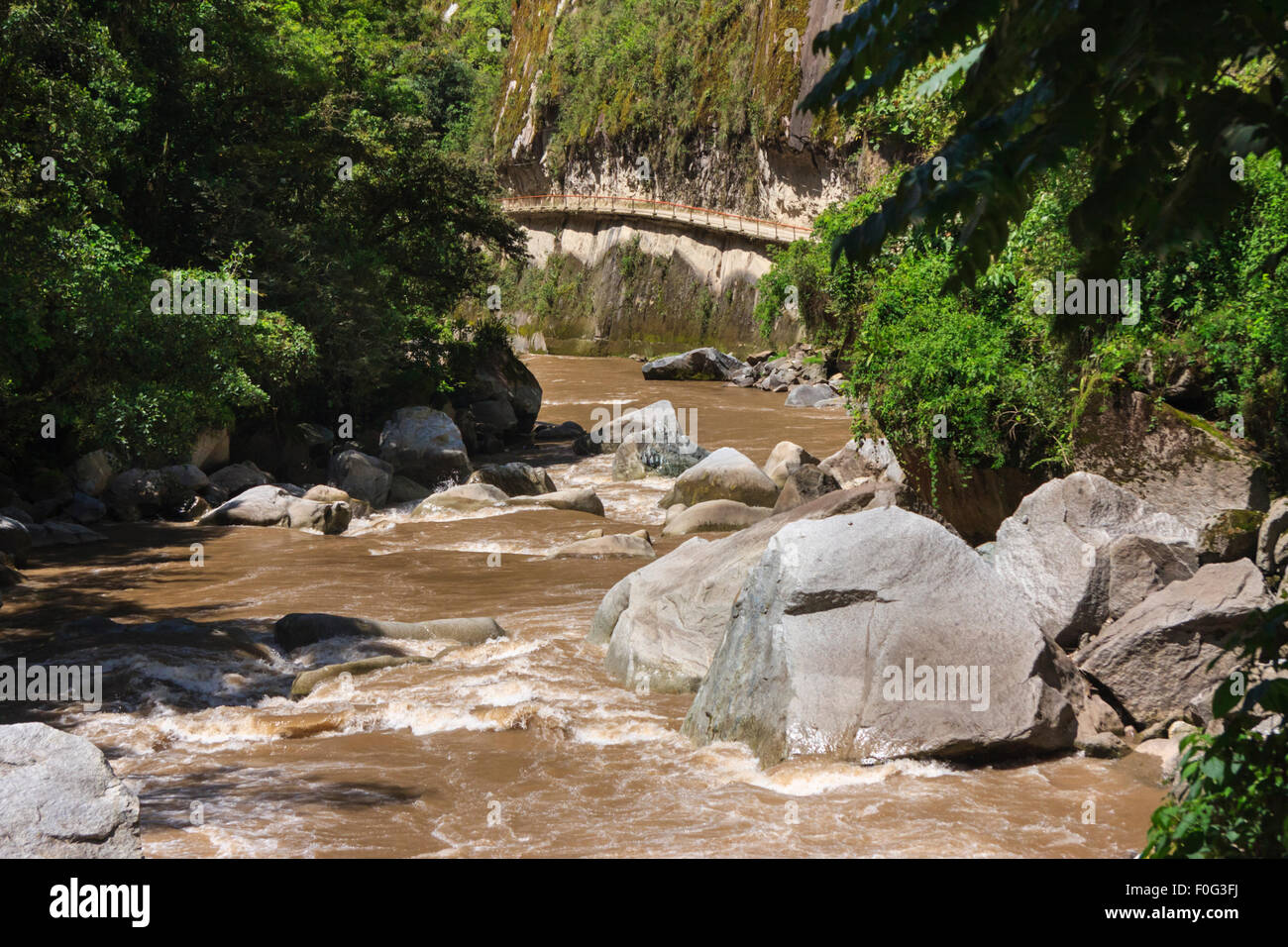 The Urubamba River, also called Rio Vilcanota, in Aguas Calientes, at the bottom of Machu Picchu in Urubamba valley, Peru Stock Photo