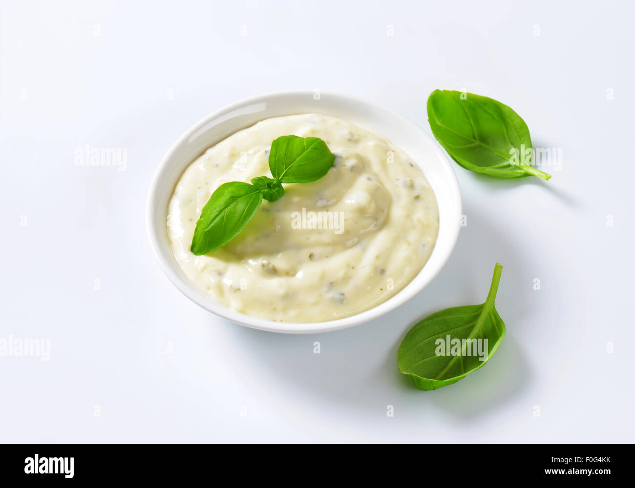 Creamy salad dressing made of mayonnaise, buttermilk, garlic, herbs