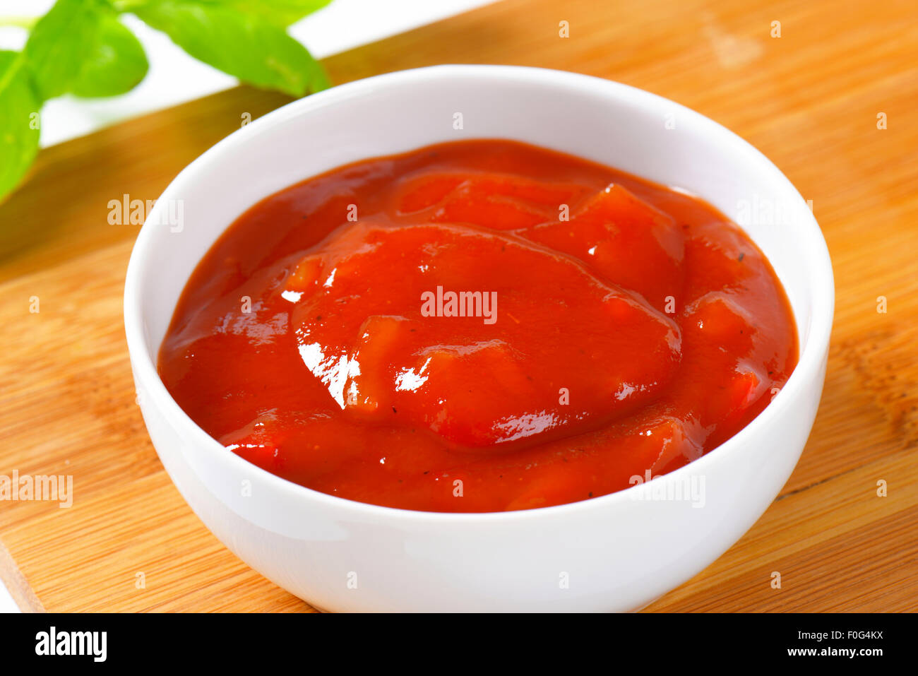 Tomato sauce with hot peppers, garlic and onion Stock Photo Alamy