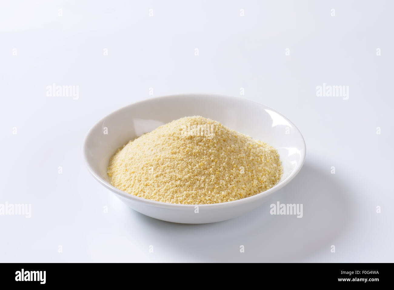 Pile of finely ground bread crumbs on plate Stock Photo