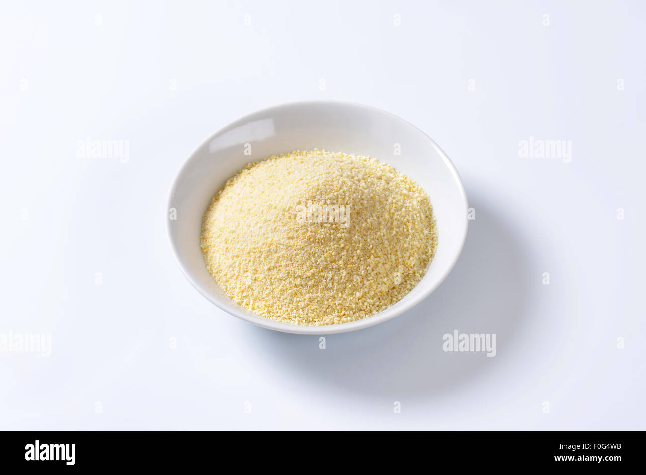 Pile of finely ground bread crumbs on plate Stock Photo