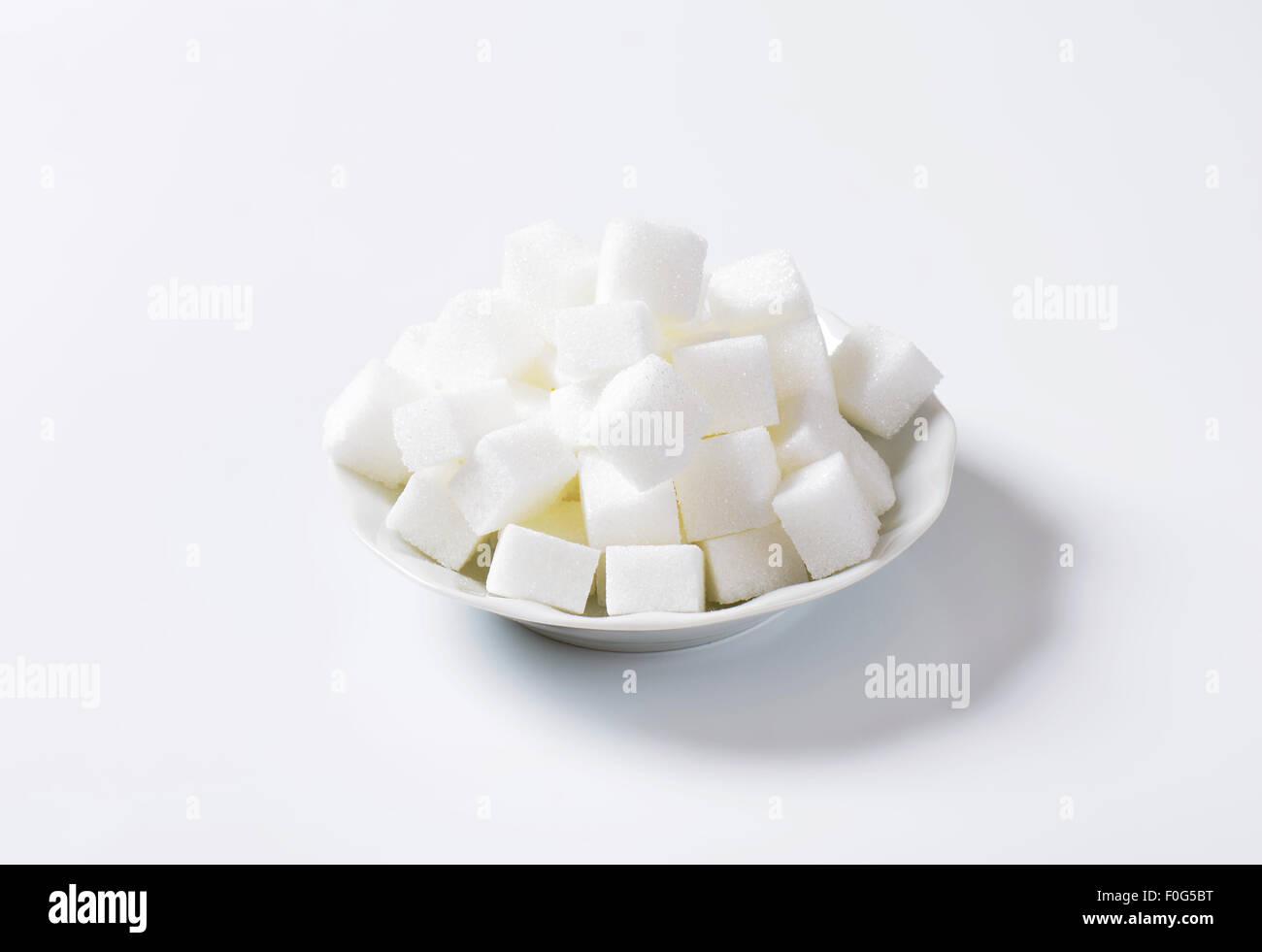 Pile of white sugar cubes Stock Photo - Alamy