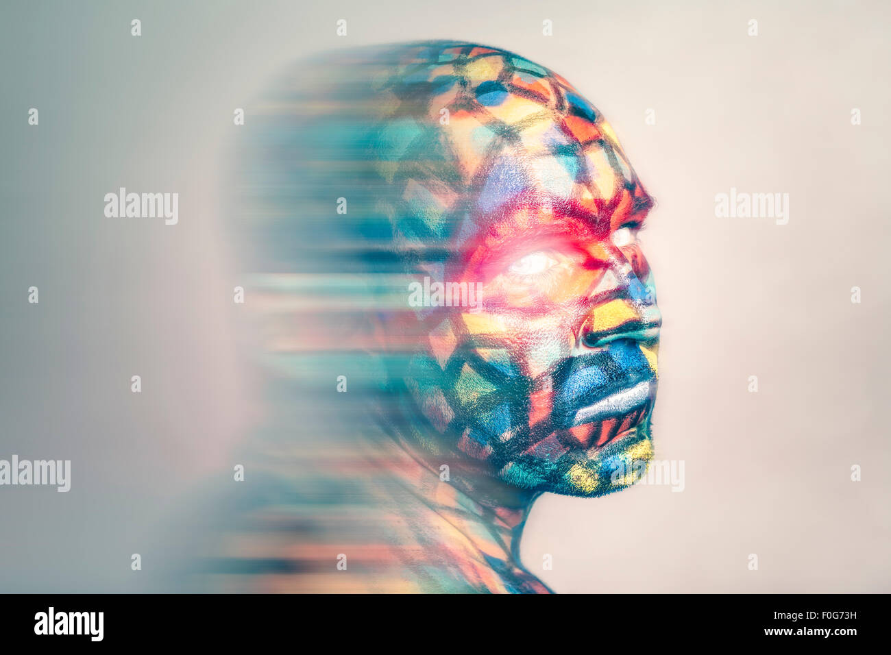 Superhero portrait, colorful face art with motion blur effect. Stock Photo