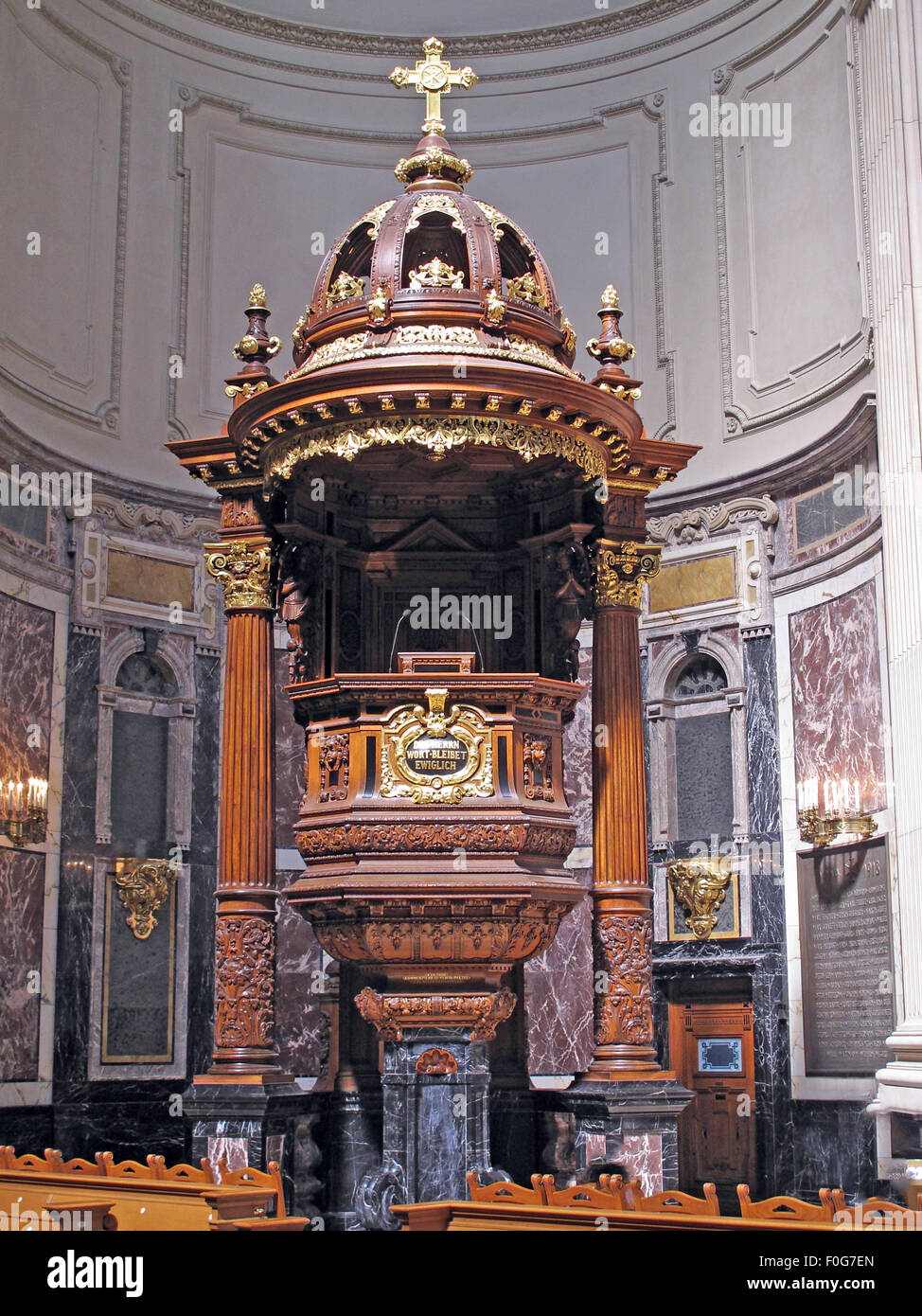 Pulpit in the Berlin Cathedral Pulpit c1905, Germany; Wood and gold design with crucifix. Stock Photo