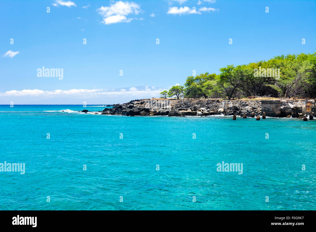 A small swimming bay used by local residents to beat the summer hear in Hawaii Stock Photo