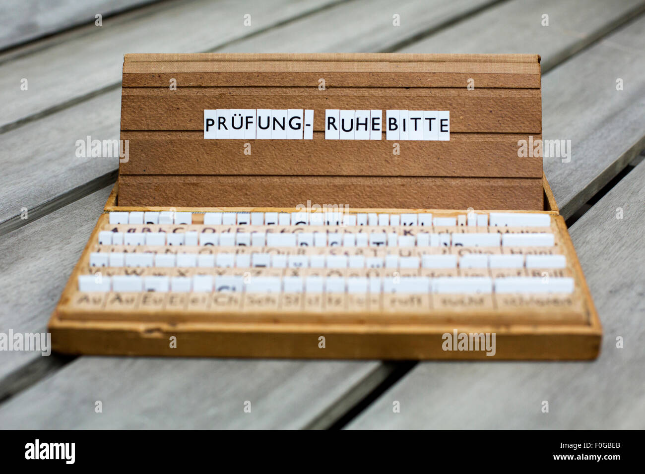 a letterbox with the german text: 'Prüfung-Ruhe Bitte' (exam-be quiet please) Stock Photo