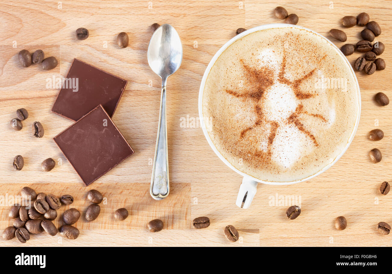 The cup of cappuccino with abstratnym pattern Stock Photo