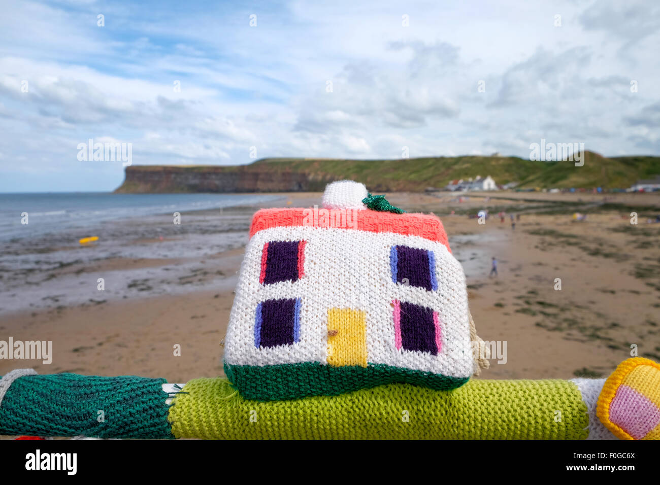 Knitted Yarn Bombing sculptures on the pier at Saltburn in Yorkshire