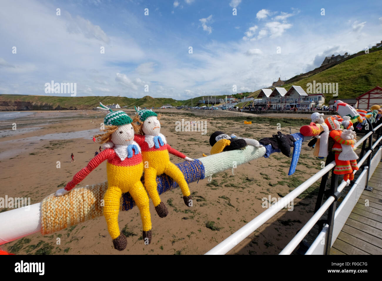 Knitted Yarn Bombing sculptures on the pier at Saltburn in Yorkshire, UK Stock Photo