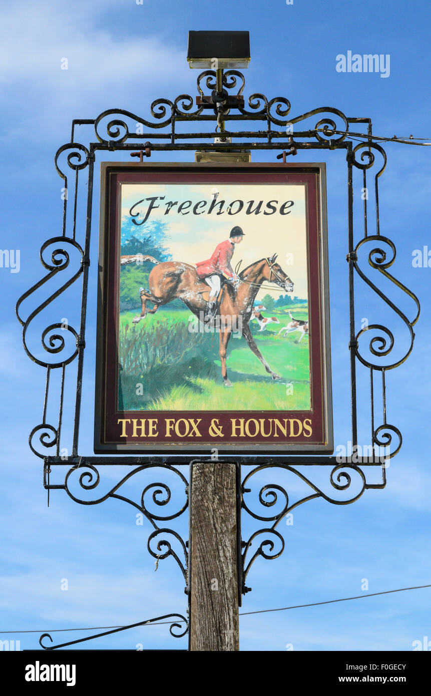 The pub sign of The Fox and Hounds Pub, Uffington, Oxfordshire, England, UK. Stock Photo