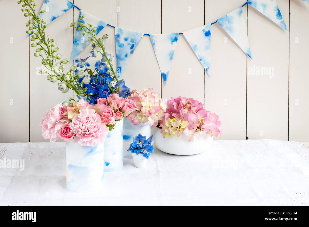 pink and blue flower arrangements for summer Stock Photo Alamy