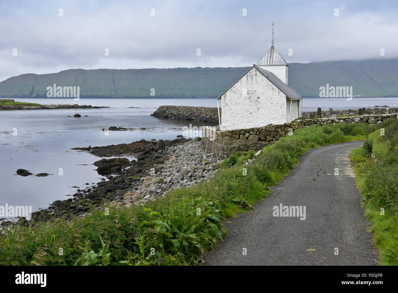 St. Olav's Church, village of Kirkjubour, Stremoy, Faroe Islands Stock Photo