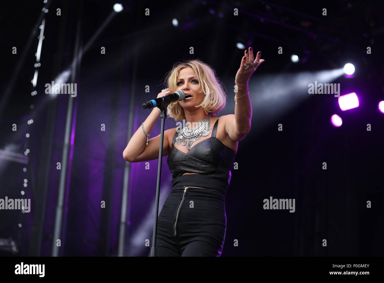 Betley, Cheshire, UK. 15th August, 2015. Former Girls Aloud singer Sarah Harding performs live