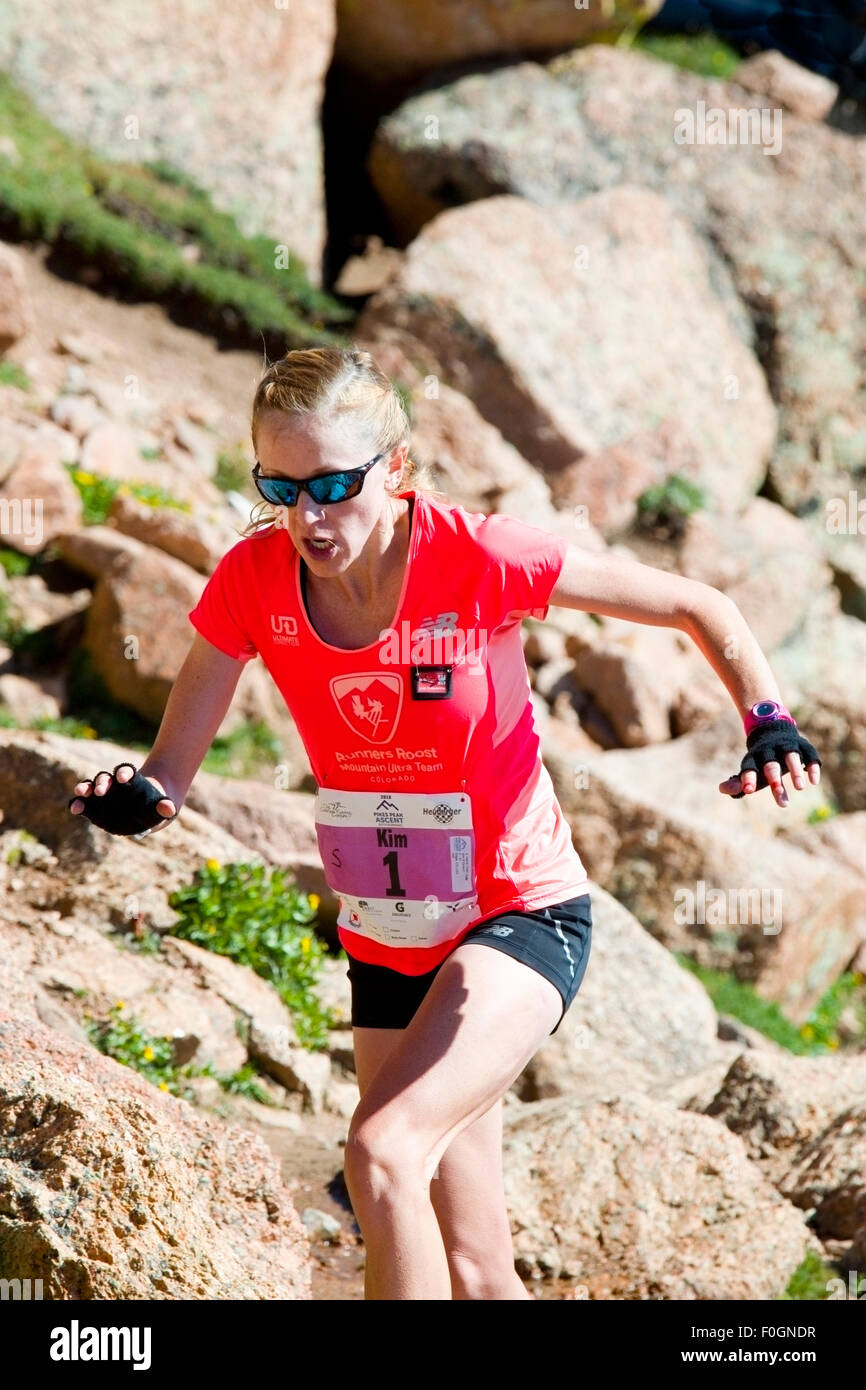 Kim S. Dobson wins first place in the women's division in the rugged Pikes Peak Ascent race up 14,115 foot Pikes Peak on the Bar Stock Photo