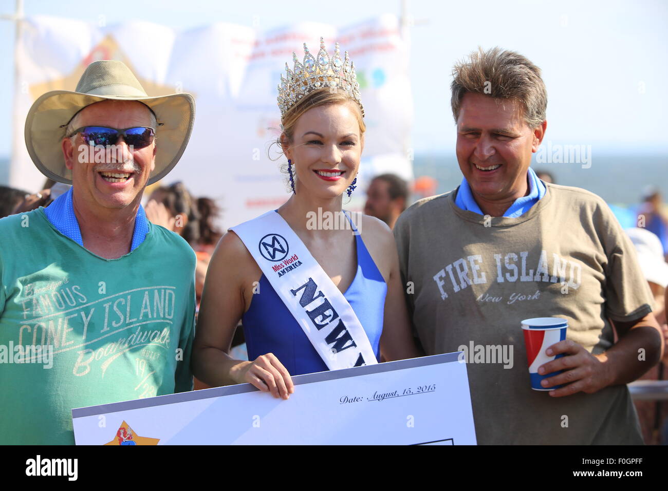 Brooklyn, United States. 15th Aug, 2015. Miss USA/New York with third place adult team. Contestants and teams participated in the 25th annual Coney Island Sand Sculpting contest. © Andy Katz/Pacific Press/Alamy Live News Stock Photo