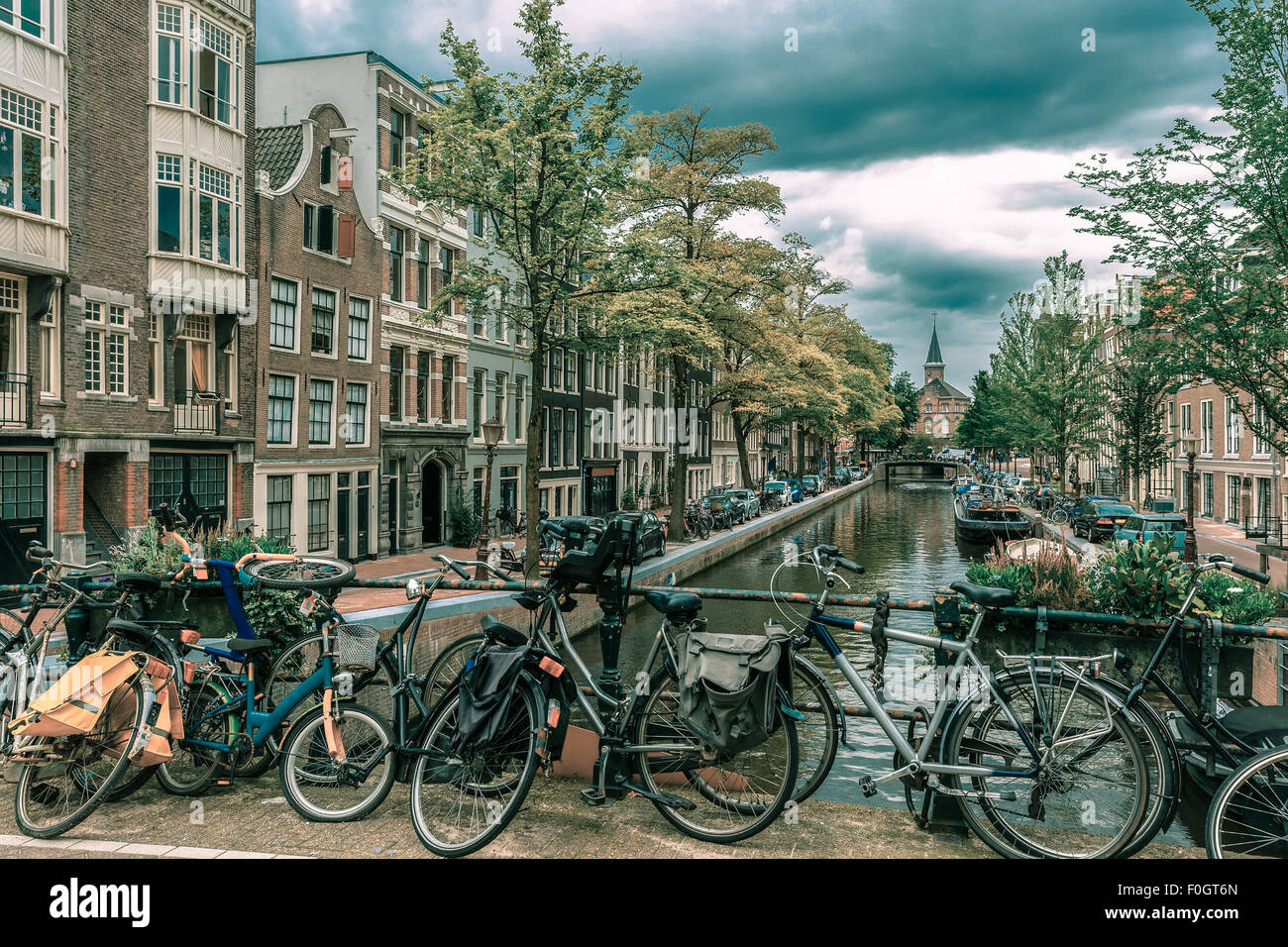 Amsterdam Canal And Bridge With Bikes Holland Stock Photo Alamy