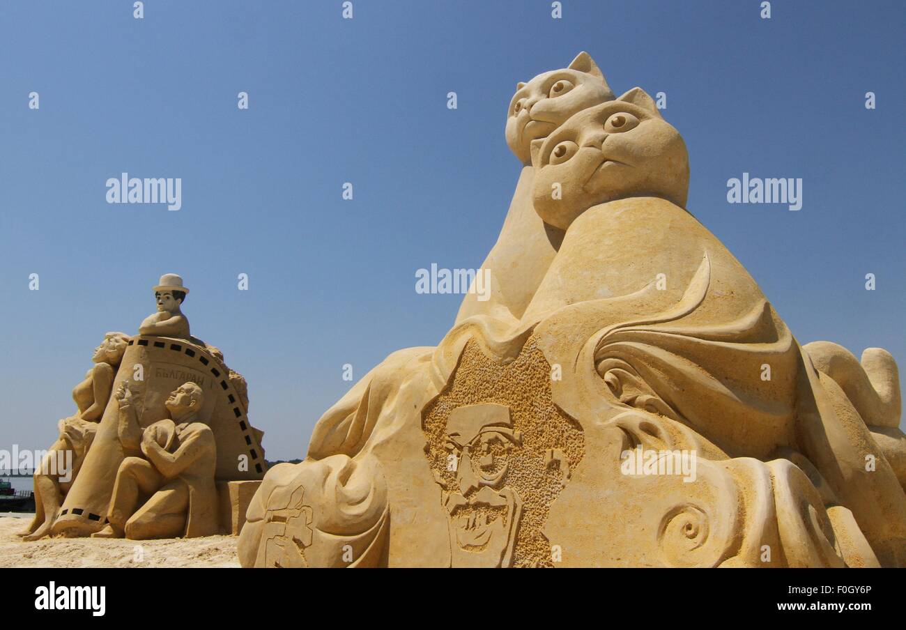 Visitors attend the International Sand Sculptures Festival in the ...