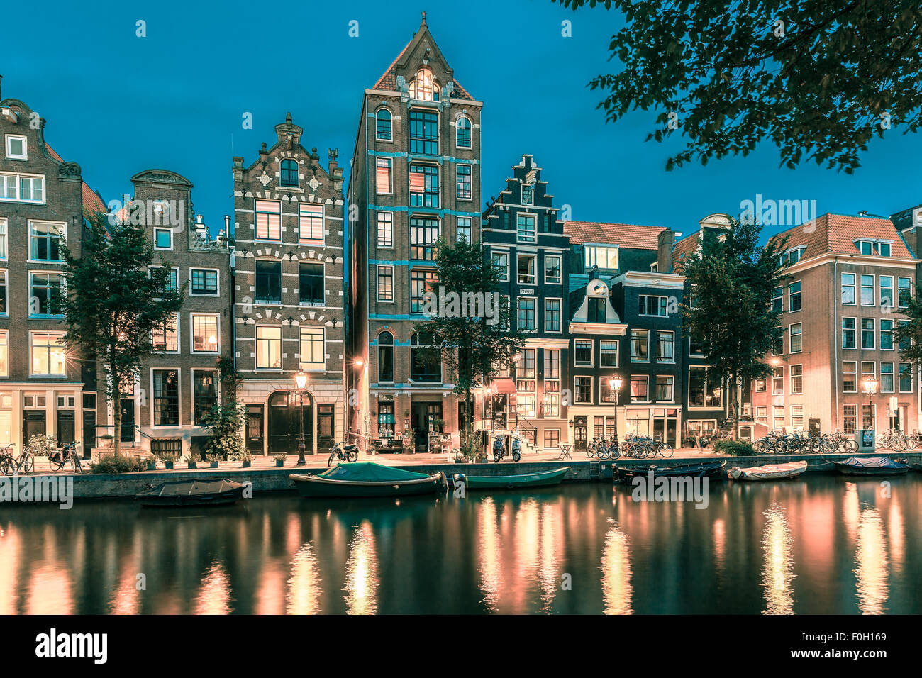 Night Amsterdam canal with dutch houses Stock Photo